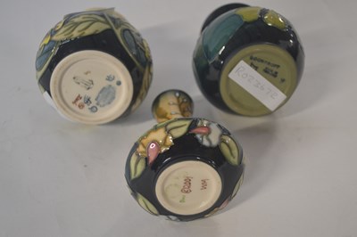 Lot 311 - Group of three small Moorcroft vases, one...