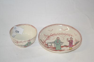 Lot 329 - A Liverpool porcelain tea bowl and saucer in...