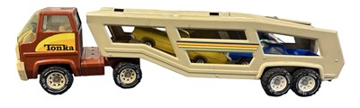 Lot 321 - A vintage pressed steel Tonka car transporter,...