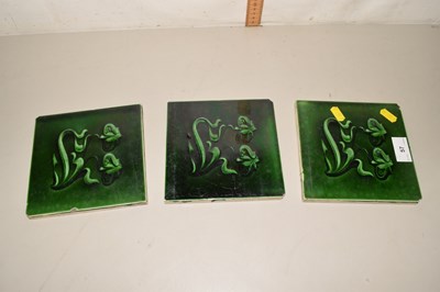 Lot 57 - A set of three Victorian green glazed tiles