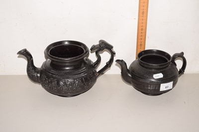 Lot 63 - Two Victorian black glazed teapots one...