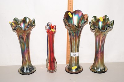 Lot 100 - A set of three Carnival Glass vases plus one...