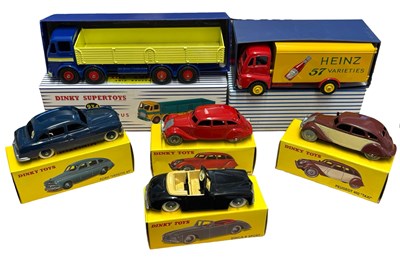 Lot 232 - A collection of boxed reproduction Dinky Toys,...