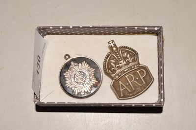 Lot 130 - A vintage ARP badge and one other