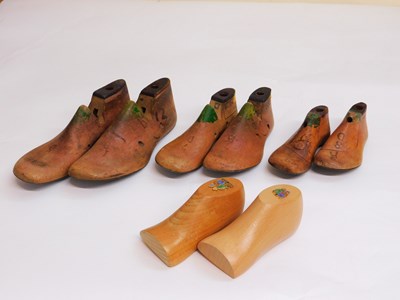Lot 112 - Four pairs of children's wooden shoe lasts,...