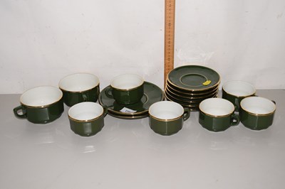 Lot 210 - A green and gilt decorated coffee set