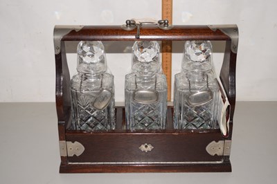 Lot 223 - A modern three bottle tantalus