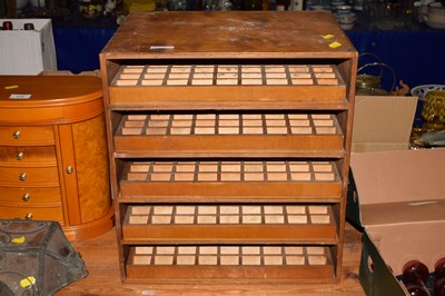 Lot 240 - A small five drawer table top cabinet for...