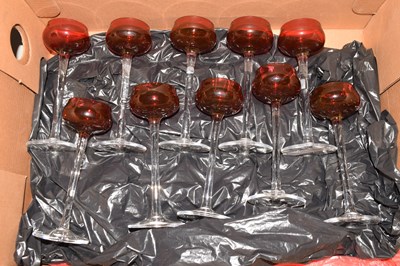 Lot 241 - A set of ruby and clear glass long stem...