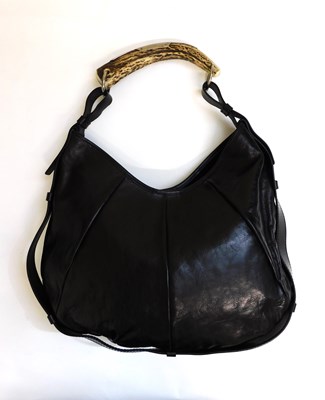 Lot 131 - Tom Ford for Yves Saint Laurent: a black...