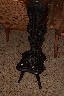 Lot 303 - An ebonised and carved spinners chair