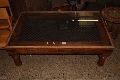 Lot 316 - A Sheesham hardwood metal mesh and glass...