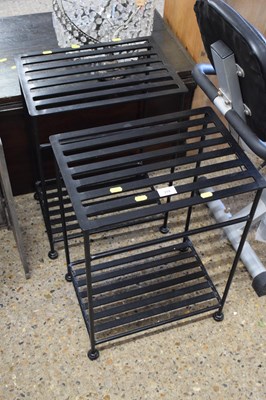 Lot 319 - A pair of black finish iron lamp tables