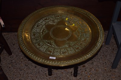 Lot 322 - A brass Bonares type folding tray top table