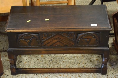 Lot 332 - A small 20th Century oak flip top box with...