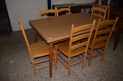 Lot 355 - A retro melamine covered kitchen table and six...