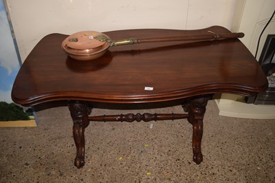 Lot 327 - A Victorian mahogany serpentine centre table...
