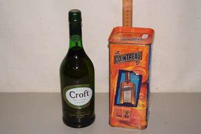 Lot 526 - A bottle of Cointreau in presentation tin and...