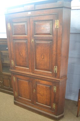 Lot 412 - A large Georgian oak floor standing corner...