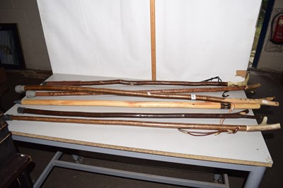 Lot 630 - Six assorted walking sticks, some with antler...