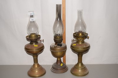 Lot 662 - Three oil lamps (a/f)