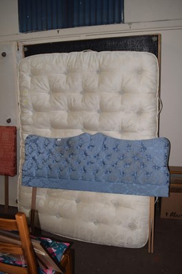 Lot 704 - A double bed with headboard and mattress