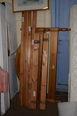 Lot 721 - A pine double bed frame to include mattress
