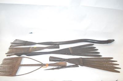 Lot 448 - A group of three 19th Century iron eel cleaves...