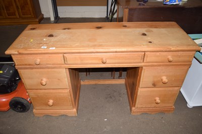 Lot 728 - A pine twin pedestal desk