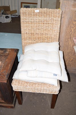 Lot 771 - A rush seat and back dining chair with cushion