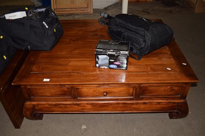 Lot 795 - A Oriental style coffee table