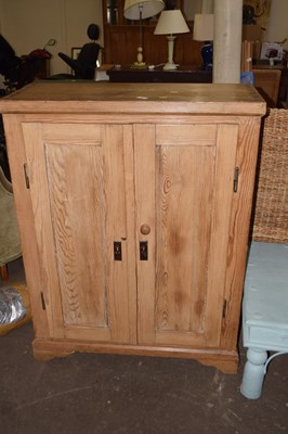 Lot 800 - A pine cupboard unit with two drawers