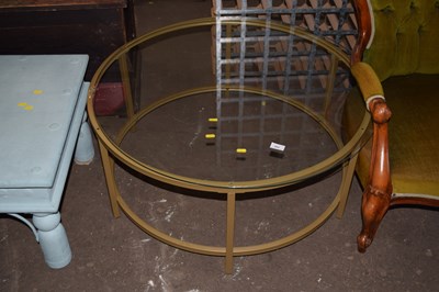 Lot 802 - A glass circular coffee table