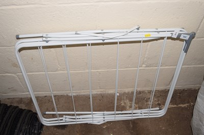 Lot 811 - A metal clothes drying rack