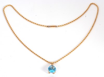 Lot 85 - A topaz pendant necklace, the pear shape topaz,...