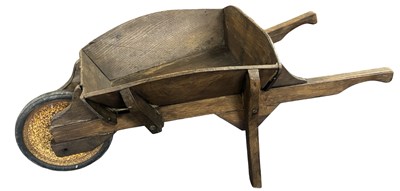 Lot 506 - An antique child's wooden wheelbarrow, length...