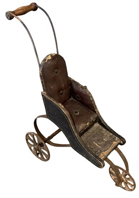 Lot 507 - An antique wood and iron single doll's pram...