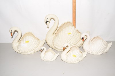 Lot 17 - A group of five Dartmouth Pottery swan shaped...