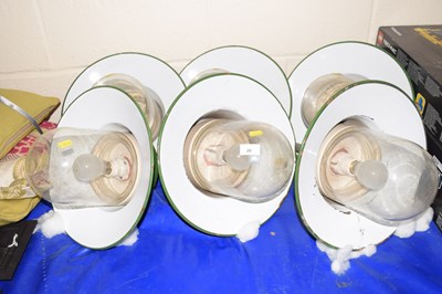 Lot 26 - A set of six industrial light fittings