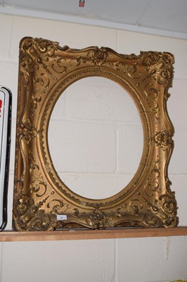 Lot 37 - A large 19th Century gilt picture with oval...
