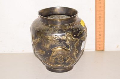Lot 52 - An Oriental brass vase