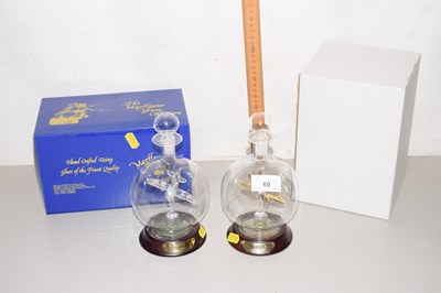 Lot 60 - Two glass novelty Spitfire decanters