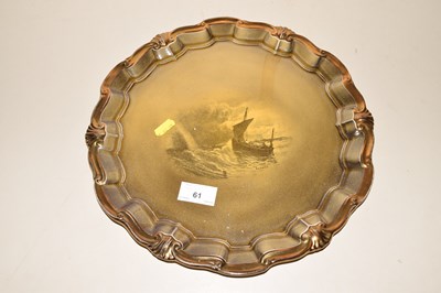 Lot 61 - A vintage wall plate decorated with a ship on...