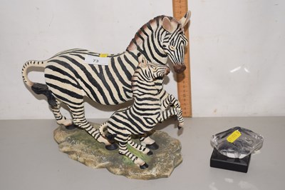 Lot 73 - A resin model of zebras together with a...