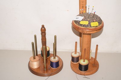 Lot 93 - Two cotton reel stands