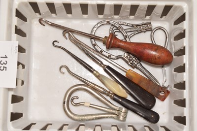 Lot 135 - Box of various button hooks