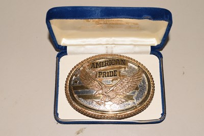 Lot 153 - An American Pride belt buckle together with a...