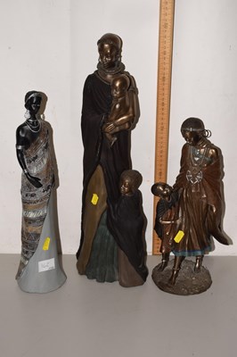 Lot 162 - A group of three bronzed resin Maasai figures