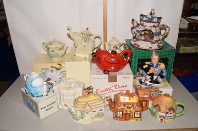 Lot 164 - A collection of various novelty teapots
