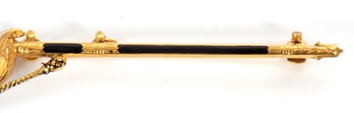 Lot 90 - A 9ct sword brooch, the sword with black...